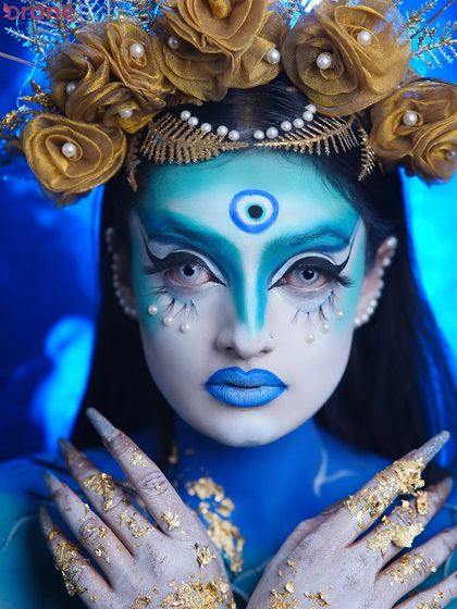 A striking close-up that focuses on the eyes and the symbolic third-eye design, demonstrating precision and artistry.