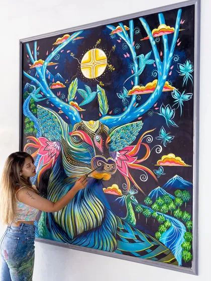 'The celestial grace in blue' is a large panel mural I painted in Uttarakhand. This piece showcases my love for intricate, free-flowing designs that blend nature with surreal and spiritual elements. It’s an example of how we can create a statement decor piece that is both magical and deeply personal.