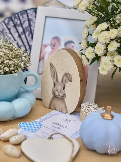 More personalized details, including a cute bunny figurine and a miniature painted pumpkin, adding a touch of playfulness to the tablescape.