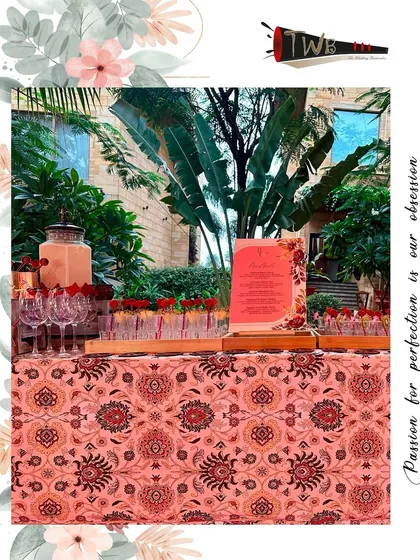 A wide view of a personalized bar, complete with a custom menu and themed tablecloth, ensuring every element aligns with the client's vision.
