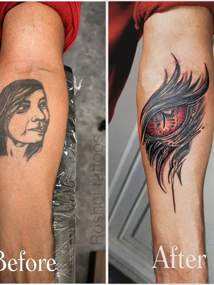 This is the magic of a cover-up. We took a faded, unwanted portrait and transformed it into a powerful and mysterious dragon's eye. Using deep blacks and vibrant red, the new design completely hides the old one, giving my client a fresh start with a piece of art they truly love.
