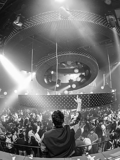 Another black and white wide shot of the scene at Prism Mohali.