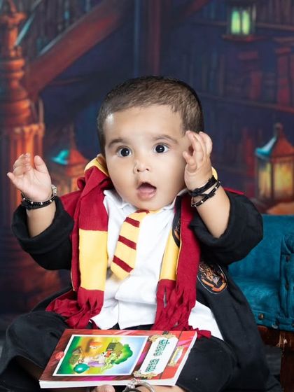 Wingardium Leviosa! This little wizard is surprised by his own magic in our Harry Potter-themed shoot.