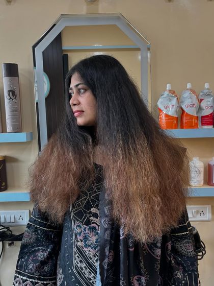 Another look at the hair before the transformation. You can see the dryness and lack of definition. This is a common challenge that I love to tackle.