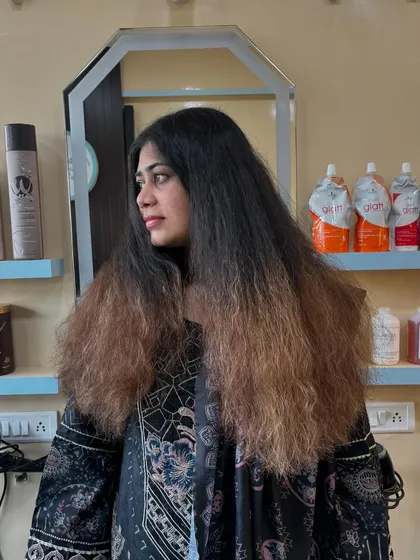 Another look at the hair before the transformation. You can see the dryness and lack of definition. This is a common challenge that I love to tackle.