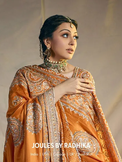 Another elegant pose from Hansika Motwani, showcasing the versatility and regal appeal of our handcrafted choker sets.