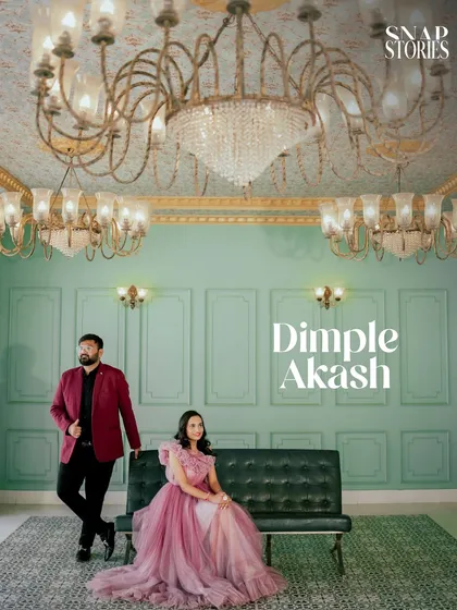 A regal portrait of a couple in a room with mint-green walls and magnificent chandeliers. This setup is ideal for a luxurious and opulent pre-wedding theme.