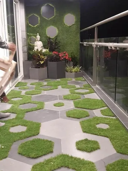 For this balcony makeover, I used a creative combination of hexagonal tiles and artificial grass patches. It’s a modern, playful design that adds texture and greenery while being easy to maintain.