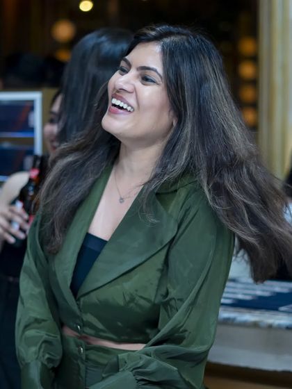 A candid shot of a guest laughing and enjoying the show. My nights are filled with as much laughter as they are with music.