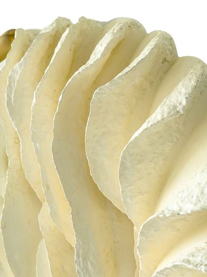 The intricate, wave-like layers of "The Awakening Cycle" (Series 1). I sculpt each layer from upcycled paper to create a sense of movement and depth, as if the piece itself is breathing.