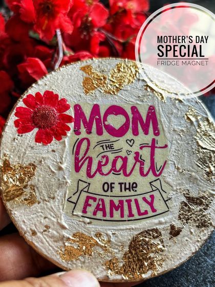 "Mom, the heart of the family." Another lovely Mother's Day magnet design, this one with gold leaf accents and a preserved red flower.