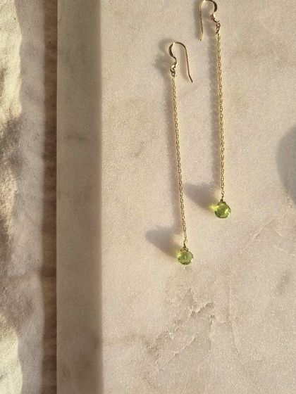 Do you need a gemstone to reduce stress? Peridot is a wonderful choice. These are my 'sū́ra' Peridot heart-shaped drop earrings, which help reduce stress, anger, and guilt.