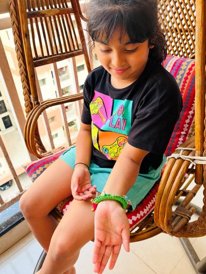 Little Vidita admiring her new bangle. I made this piece to be light and comfortable for small wrists, while still being full of character.