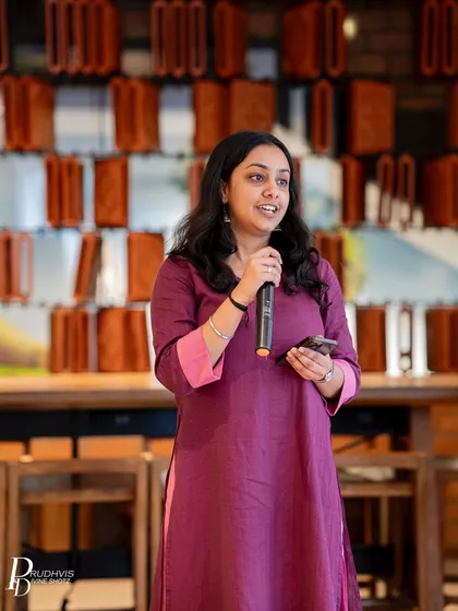A poet shares her work with grace and confidence at a Sunday open mic. Our platform is dedicated to giving voice to stories that need to be told.