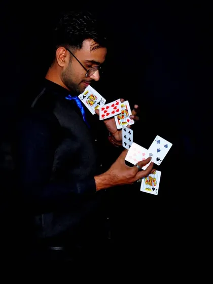 A cascade of cards frozen in motion. This is the art of card manipulation, a visually stunning skill I bring to my performances.