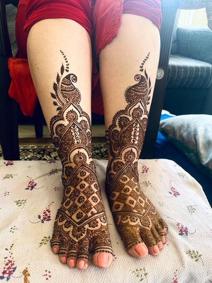A duplicate of 274, this image provides another angle of the dense and beautiful foot mehndi.