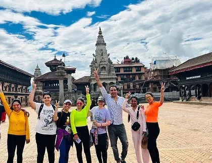 The group celebrating our visit to Bhaktapur, a city of devotees. The joy of exploring such a culturally rich world heritage site together is evident on everyone's faces.