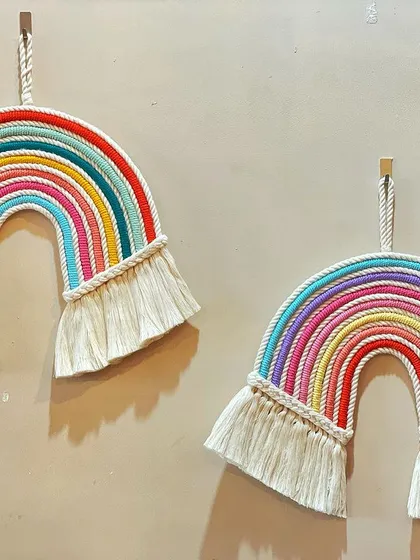 Nothing brings a smile like a rainbow. I make these chunky macrame rainbows in various sizes and color combinations to add a splash of cheer to a child's room or any happy space.