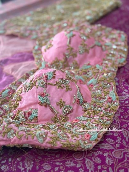 The front of the pink bird motif blouse.