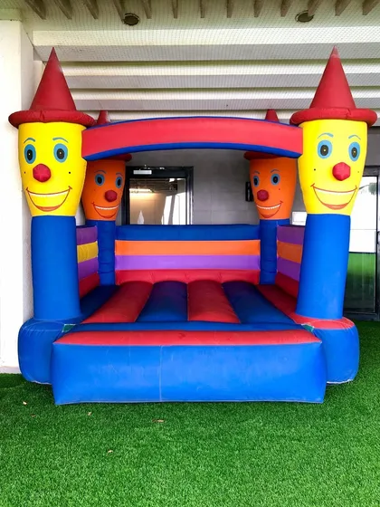 The classic Clown Bouncy is a cheerful and colorful addition to any kids' party. This standard-sized bouncer fits well in backyards or on artificial turf for simple, jumping fun.