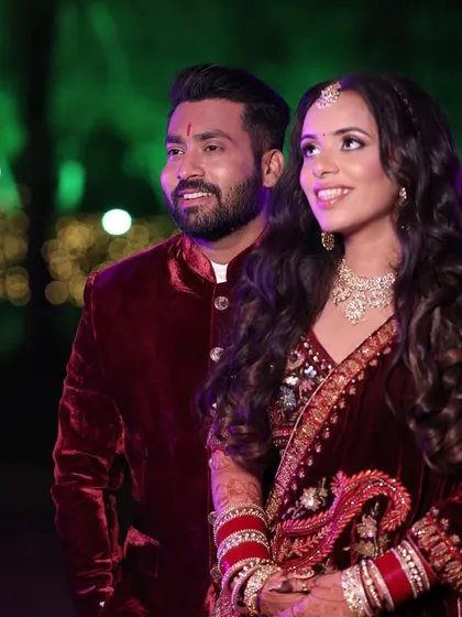 Palak's reception look was all about subtle elegance. Her multi-colored lehenga was paired with a soft makeup look and beautiful open waves.