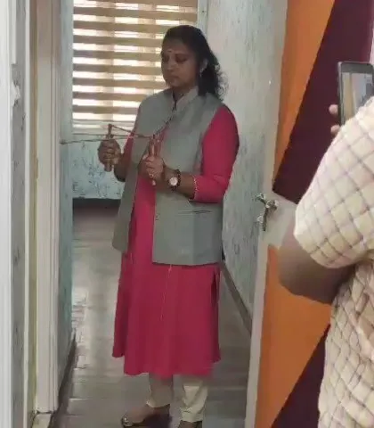 Here you can see me during an on-site consultation, using a dowsing rod to check the energy flow in a client's home. This is part of my scientific approach to Vastu. These tools help me physically detect and show you where the negative and positive energy zones are, allowing for precise and effective remedies.