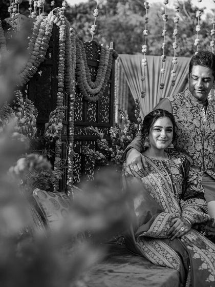 A classic, quiet portrait amidst the lively Mehendi celebrations in Delhi. This black and white shot has a timeless feel, capturing a moment of calm and connection.