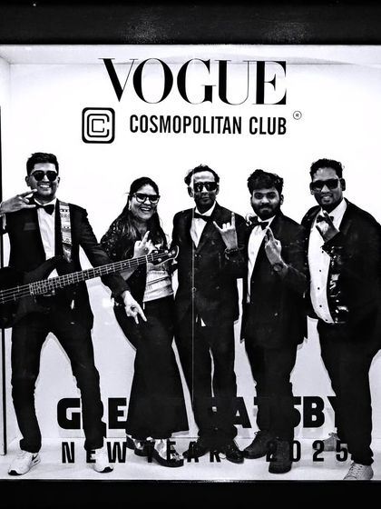 Another fun pose from the New Year's Eve party. We always bring our style and energy to every event.