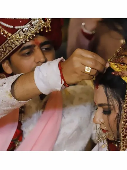 The sindoor ceremony, a symbol of their union. A very sacred and beautiful moment.