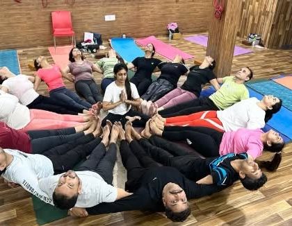 Another view of our partner yoga circle, creating a beautiful human mandala of strength and unity.