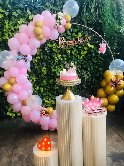 My "Bride to Be" cake and matching cupcakes set up at a beautiful bridal shower. I love seeing how my creations fit into your gorgeous party decor.