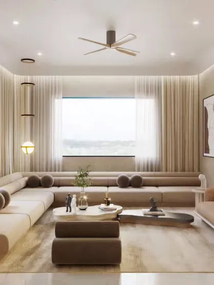 Two views of a minimalist living room with a large, modular sofa. The focus here is on the soft, neutral color palette and the abundance of natural light, creating a feeling of spaciousness and tranquility.