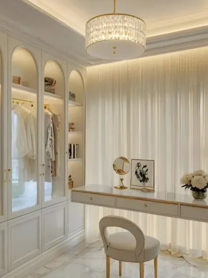 We are currently offering a 10% discount on all our interior design services. This image showcases a luxurious walk-in closet and vanity we designed.