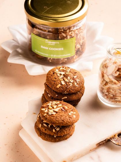 A stack of my Ragi Cookies, topped with almond slivers. These cookies are a powerhouse of nutrition, rich in calcium and fibre from the wholesome ragi flour.