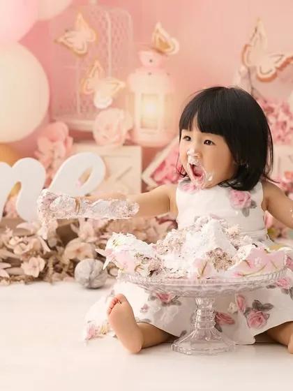 Nothing says "first birthday" like the pure, messy joy of a cake smash. We capture all the fun as your little one explores their first birthday cake in our beautifully styled setups.