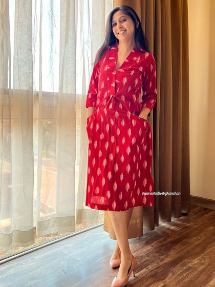 Our red handloom Ikat dress-cum-kurta is a true bestseller. It's versatile enough to be worn as a dress or paired with pants, and it comes with two pockets for convenience.