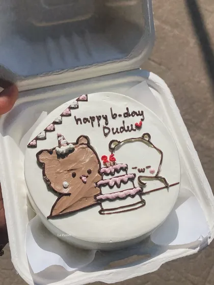 An adorable "Dudu Bubu" cartoon bento cake for a birthday. I can recreate your favorite characters for a personalized touch.