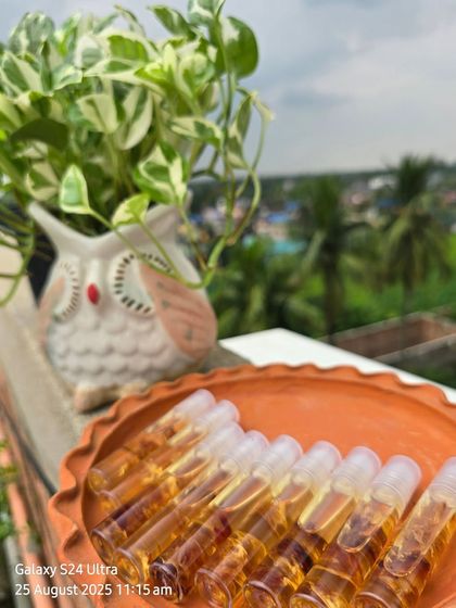 My Lip Serum Oil pictured outdoors, showing the natural, clean ingredients I use in all my handmade products.