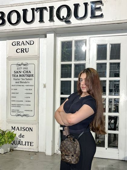 The client enjoying her new caramel latte hair color. The transformation was a success.