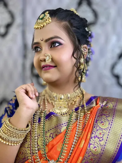 Another angle of the Nauvari bride, highlighting the detailed hair accessories and makeup.