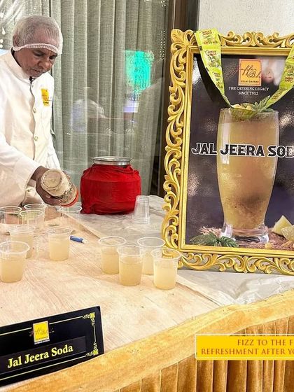 Add some fizz and flavor to your event with our Jal Jeera Soda counter. This traditional digestive drink is the perfect refreshing beverage to serve after a hearty meal, prepared fresh for your guests.