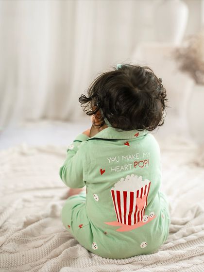 "You make my heart pop!" The back of this little one's pajamas says it all. The details in the outfits add so much personality to a shoot.