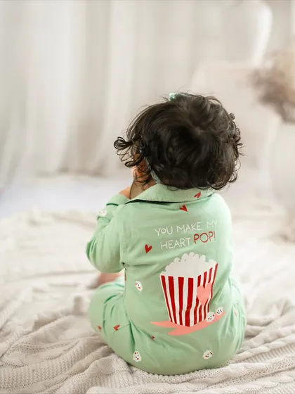 "You make my heart pop!" The back of this little one's pajamas says it all. The details in the outfits add so much personality to a shoot.