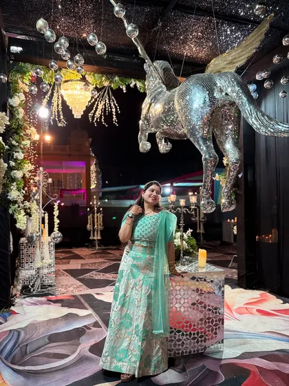 Taking in the full view of a fantastically decorated sangeet venue. The right atmosphere makes the performance even more special for the couple and their families.
