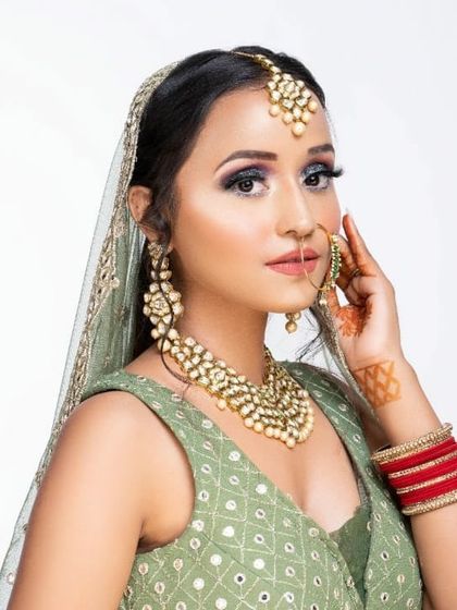 Our client looking confident and beautiful in her rented Mehendi outfit. We have options for every single one of your wedding events.