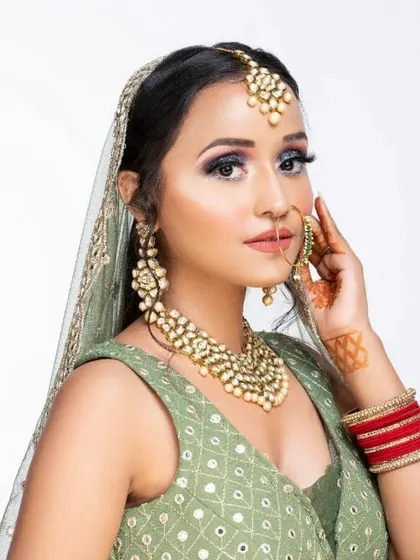 Our client looking confident and beautiful in her rented Mehendi outfit. We have options for every single one of your wedding events.