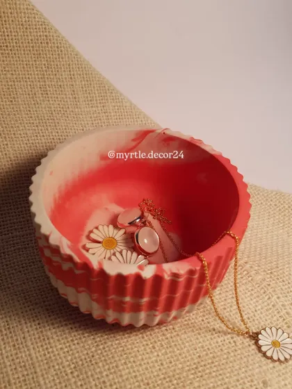 Another perspective of our red and white marble round jar, showing how the light catches the patterns.