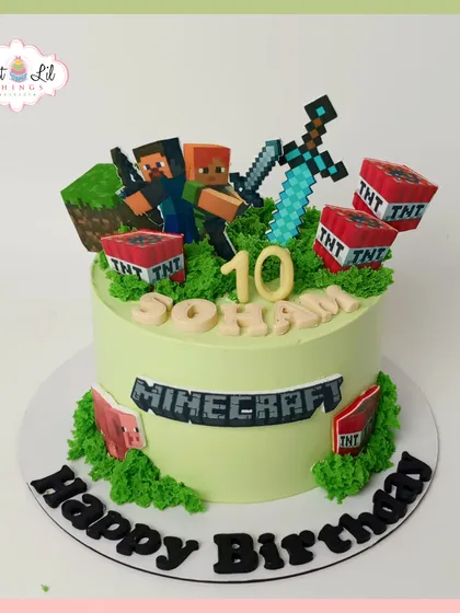 We build birthday adventures block by block with this exciting Minecraft-themed cake. It features popular characters, TNT blocks, and a diamond sword, all handcrafted from fondant to delight any young gamer on their special day.