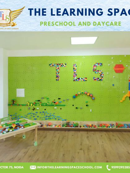The Lego wall is a hub of creativity and engineering. Here, children work together to build rockets, landscapes, and anything their imagination desires, developing fine motor skills and spatial awareness.