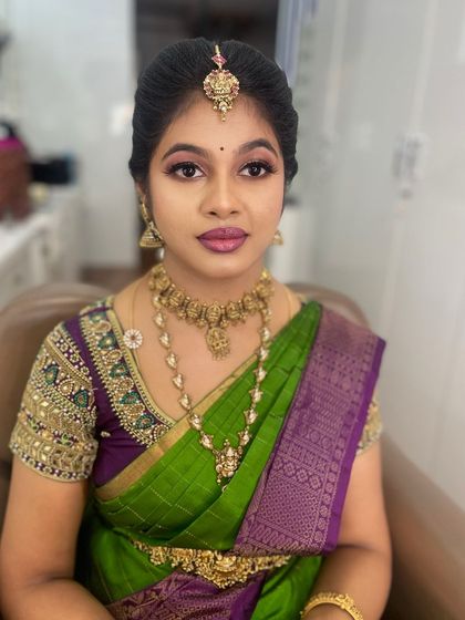 Another portrait of my friend, showcasing her party makeup. The look is designed to be vibrant and long-lasting for a full day of celebrations.